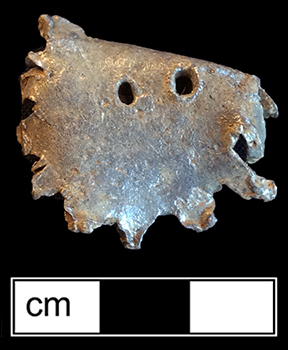 Lead whizzer. 1.25” diameter - from 18CV91. Shown on right is a whizzer recovered in Boston marked with name of Thomas Althorp. Courtesy of the City of Boston Archaeology Program.